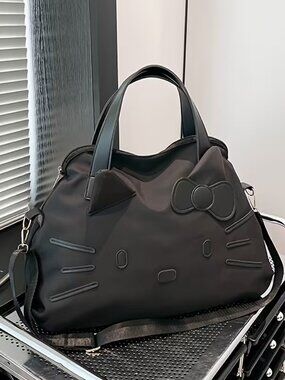 A Large Capacity Women'S Fitness Bag Featuring Sanrio'S Hello Kitty -